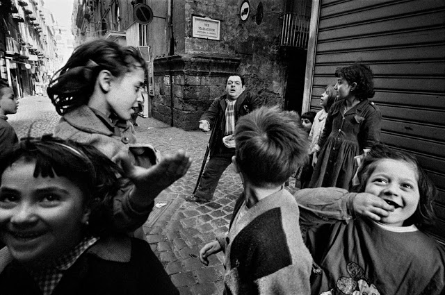 ITALY. Naples. Children and a beggar. 1962.